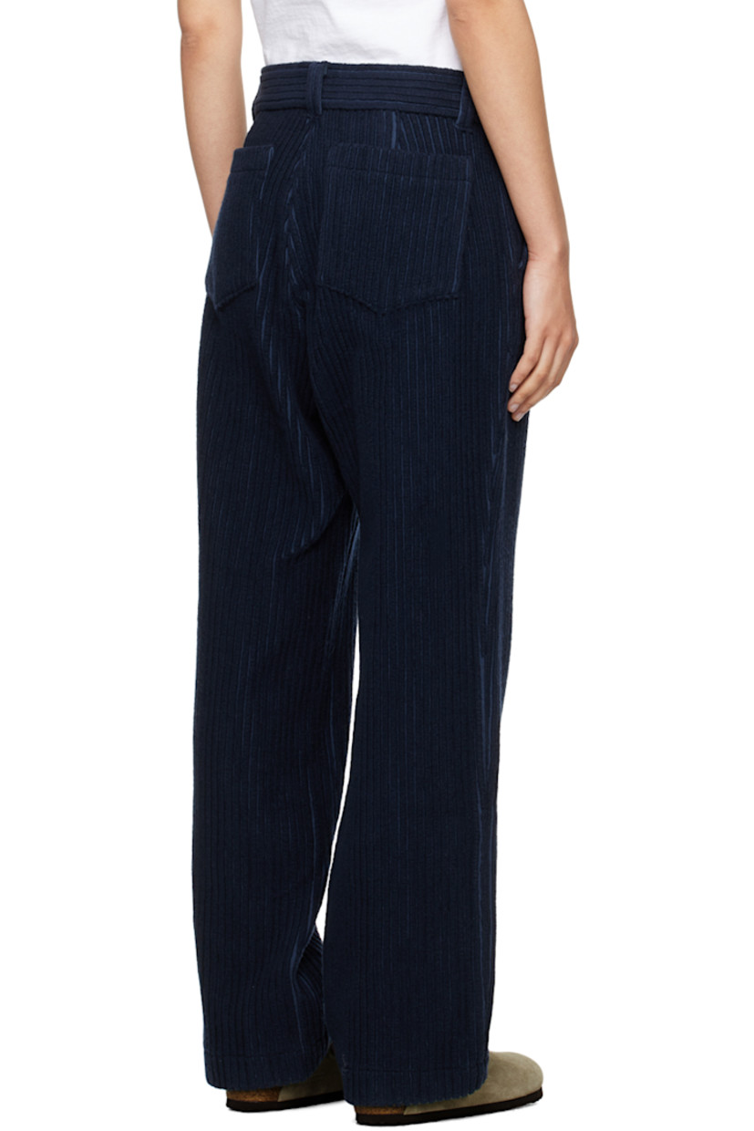Virgin wool- and cotton-blend corduroy trousers.

· Belt loops
· Four-pocket styling
· Zip-fly
· Unlined

Supplier color: Navy