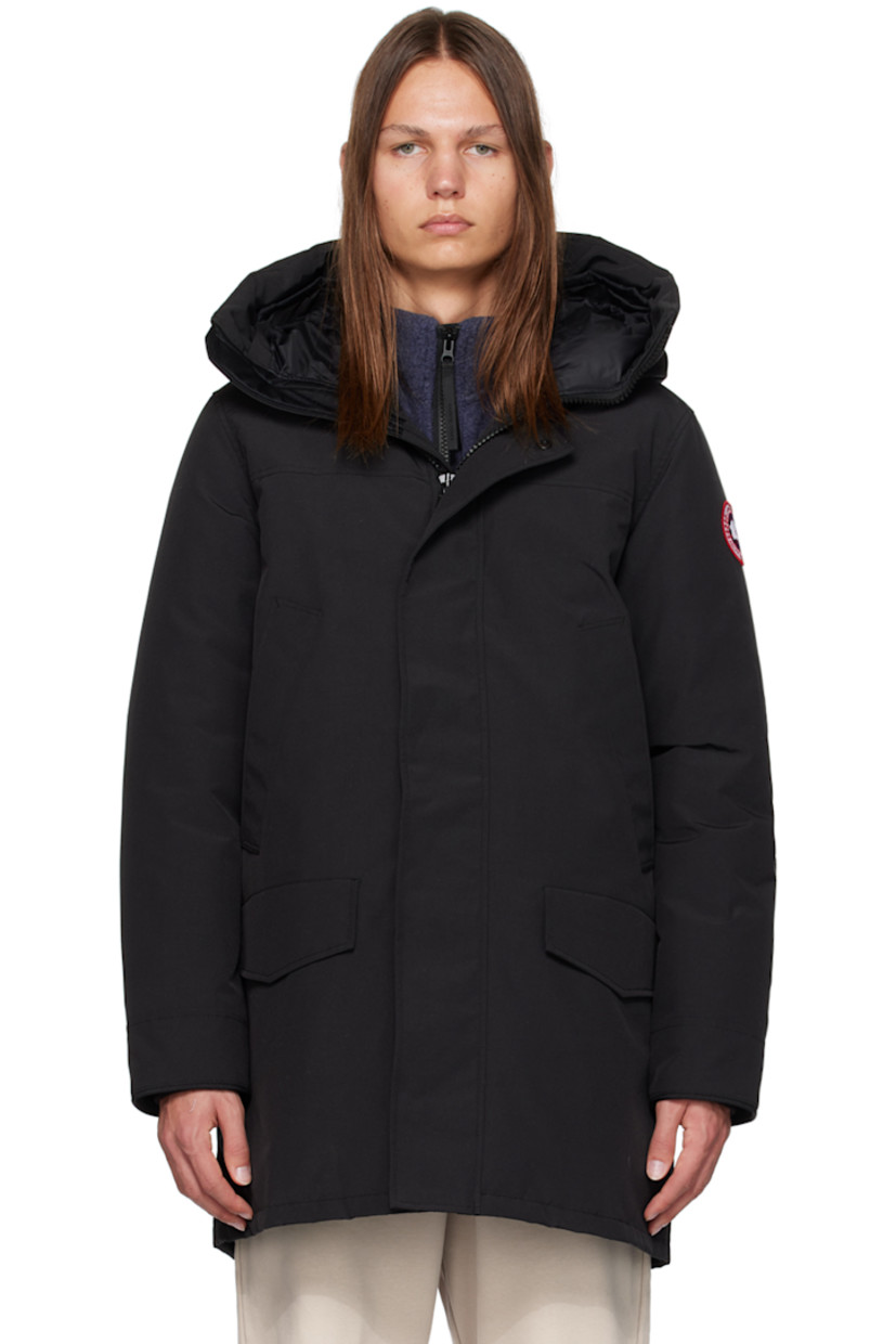 Water-repellent RDS-certified down-filled Arctic Tech® polyester- and cotton-blend canvas jacket.

· Detachable trim and cinch strap at hood
· Funnel neck
· Two-way zip closure and press-stud placket
· Welt and flap pockets
· Logo patch at sleeve
· CORDURA® piping trim at cuffs
· Inset rib knit cuffs
· Zip pocket and patch pockets at interior
· Elasticized shoulder straps at interior
· Full nylon taffeta lining

Supplier color: Black/Noir

Fill: 80% duck down, 20% duck feather.