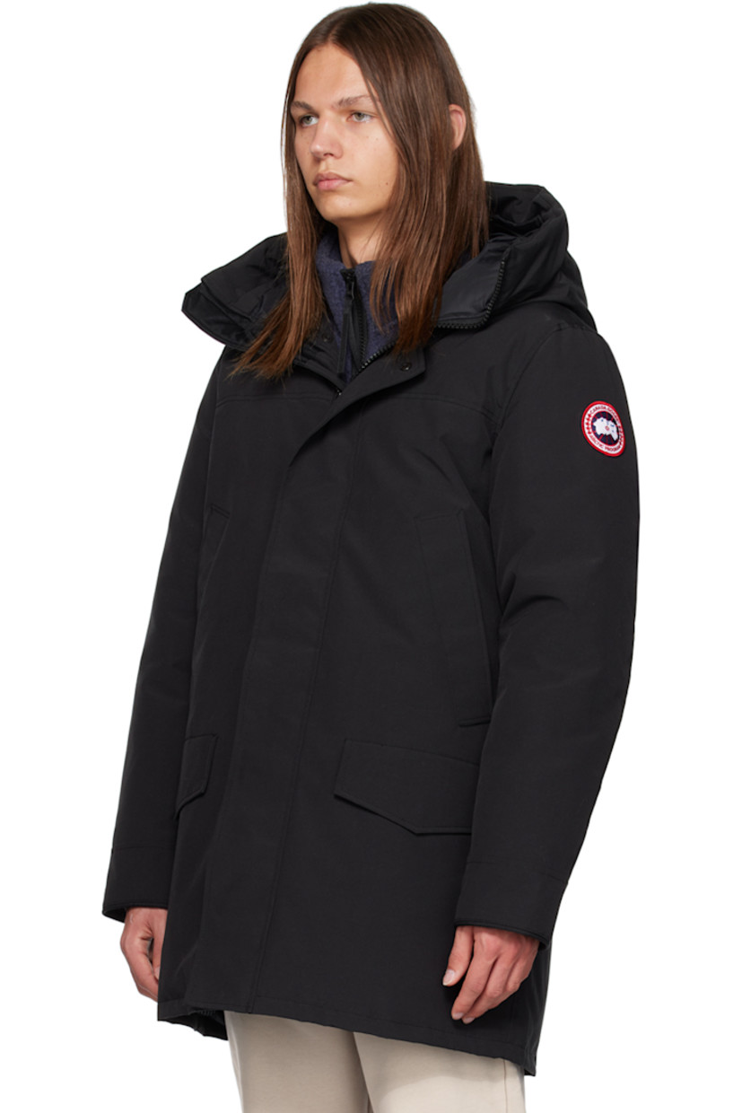 Water-repellent RDS-certified down-filled Arctic Tech® polyester- and cotton-blend canvas jacket.

· Detachable trim and cinch strap at hood
· Funnel neck
· Two-way zip closure and press-stud placket
· Welt and flap pockets
· Logo patch at sleeve
· CORDURA® piping trim at cuffs
· Inset rib knit cuffs
· Zip pocket and patch pockets at interior
· Elasticized shoulder straps at interior
· Full nylon taffeta lining

Supplier color: Black/Noir

Fill: 80% duck down, 20% duck feather.