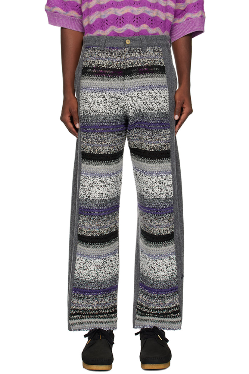 Paneled non-stretch denim and knit wool-blend jeans.

· Belt loops
· Three-pocket styling
· Zip-fly
· Logo patch at back waistband

Supplier color: Grey