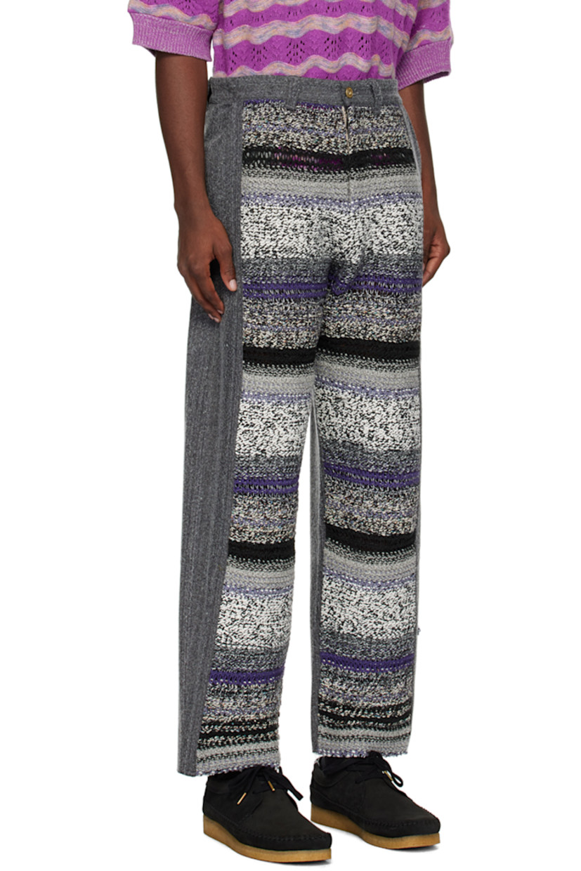 Paneled non-stretch denim and knit wool-blend jeans.

· Belt loops
· Three-pocket styling
· Zip-fly
· Logo patch at back waistband

Supplier color: Grey