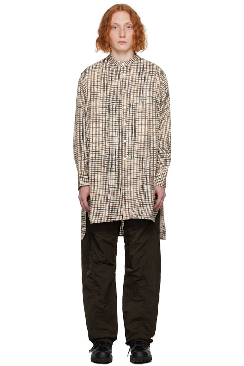 Viscose twill shirt. Check pattern printed throughout.

· Band collar
· Press-stud closure
· Drop-tail hem
· Single-press-stud barrel cuffs
· Gathering at back yoke

Supplier color: Printed check