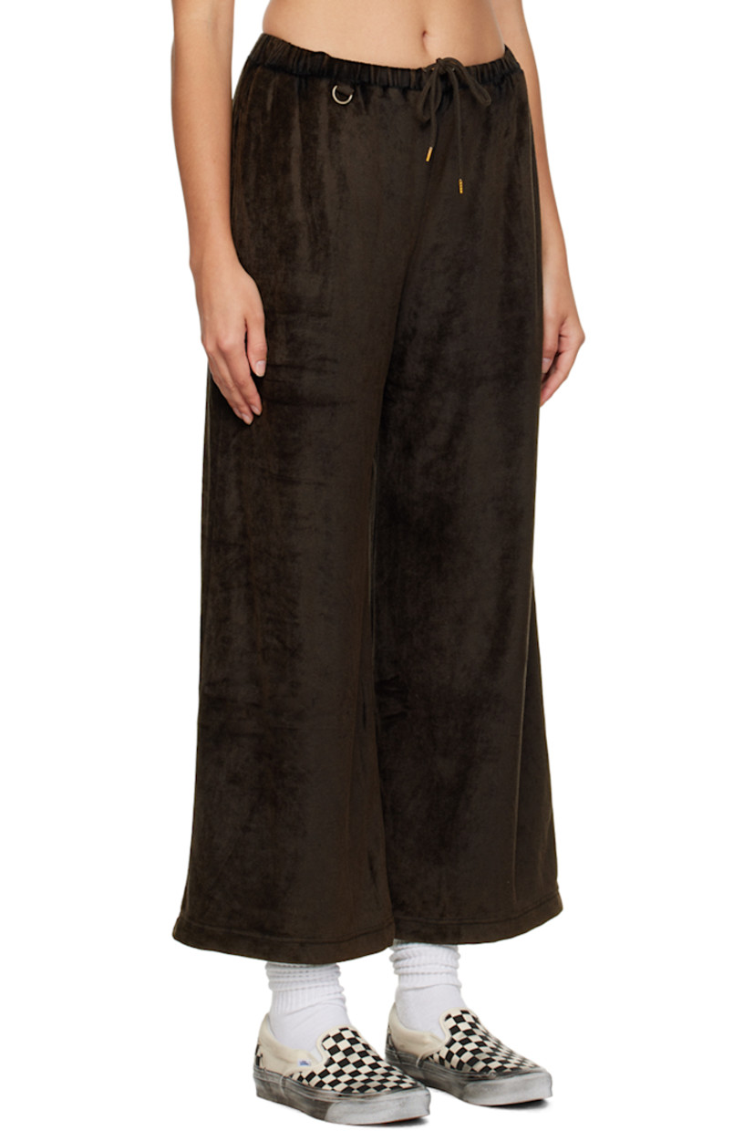 Rayon-blend velvet lounge pants. 

· Drawstring and D-ring at elasticized waistband 
· Three-pocket styling 
· Crystal-cut logo at front and back 
· Full satin lining 

This item is part of a limited run of 41. 

Supplier color: Black