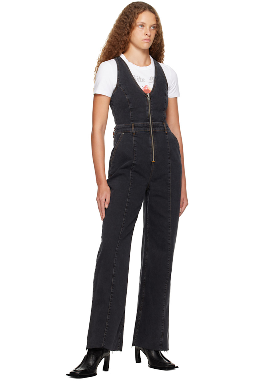 Stretch denim jumpsuit. Flap pockets throughout.

· V-neck
· Zip closure
· Four-pocket styling 
· Belt loops
· Raw edge at hem
· Graphic embroidered at back waist
· Logo embroidered at back

Supplier color: Black