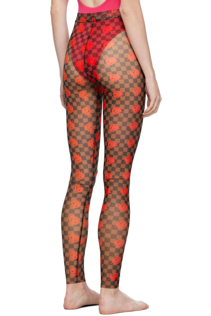 Semi-sheer stretch polyester mesh leggings. Graphic and check pattern printed throughout. 

· Elasticized waistband
· Raw edge at cuffs

Available exclusively at SSENSE.

Supplier color: Brown/Red