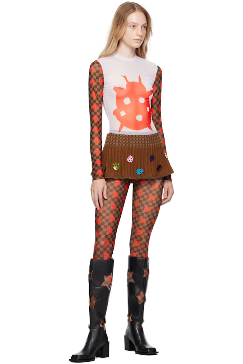 Semi-sheer stretch polyester mesh leggings. Graphic and check pattern printed throughout. 

· Elasticized waistband
· Raw edge at cuffs

Available exclusively at SSENSE.

Supplier color: Brown/Red
