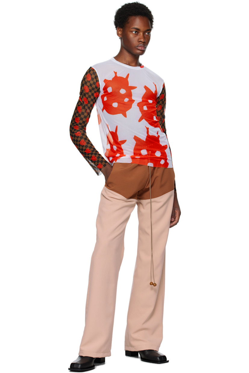 Semi-sheer stretch polyester mesh T-shirt.

· Crewneck 
· Graphics printed at front
· Raw edge at hem and cuffs
· Graphic check pattern printed at sleeves

Available exclusively at SSENSE.

Supplier color: Red/White