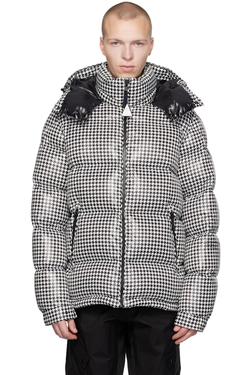 Down-filled quilted water-repellent nylon taffeta jacket. Houndstooth pattern printed throughout.

· Bungee-style drawstring at detachable hood and hem
· Funnel neck
· Zip closure
· Zip pockets
· Felted logo patch at sleeve
· Adjustable press-stud tab at cuffs
· Zip pocket at interior
· Full satin lining

Part of the 7 Moncler FRGMT Hiroshi Fujiwara collection.

Supplier color: Black white print

Fill: 90% down, 10% feather.