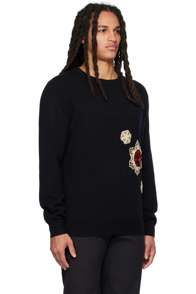 Knit cashmere sweater. 

· Rib knit crewneck, hem, and cuffs
· Handcrafted graphic appliqués at front

Available exclusively at SSENSE.

Supplier color: Black