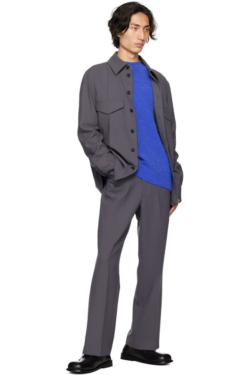 Flared stretch polyester- and virgin wool-blend crepe trousers.

· Belt loops
· Four-pocket styling
· Zip-fly
· Central crease at front and back
· Cropped legs

Supplier color: Steel