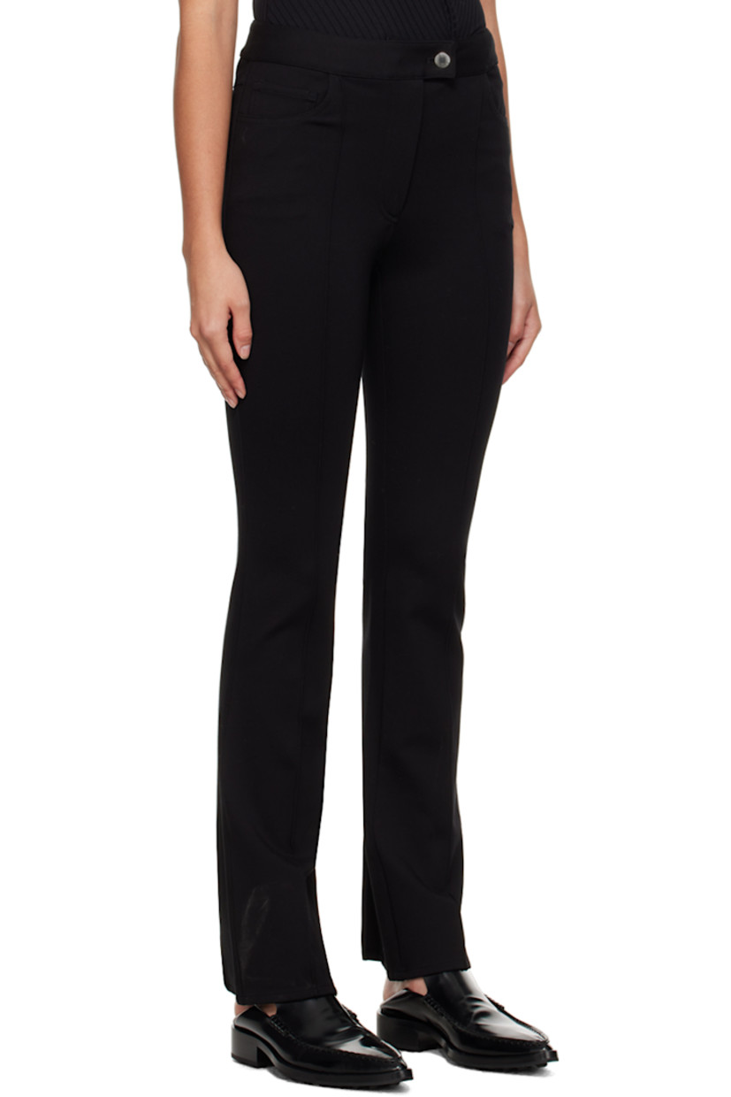 Straight-leg stretch rayon- and nylon-blend ponte jersey trousers. 

· Five-pocket styling 
· Zip-fly 
· Pinched seam at legs
· Slit at cuffs 
· Central crease at back legs 

Supplier color: Black