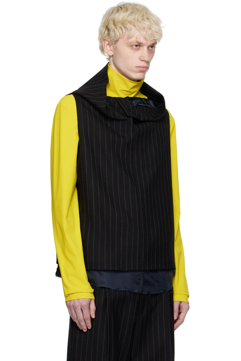 Wool twill tank top. Pinstripes throughout. 

· Four-button placket at foldover collar
· Raw edge at hem
· Seam pockets
· Full logo-woven satin lining

Supplier color: Pinstripe