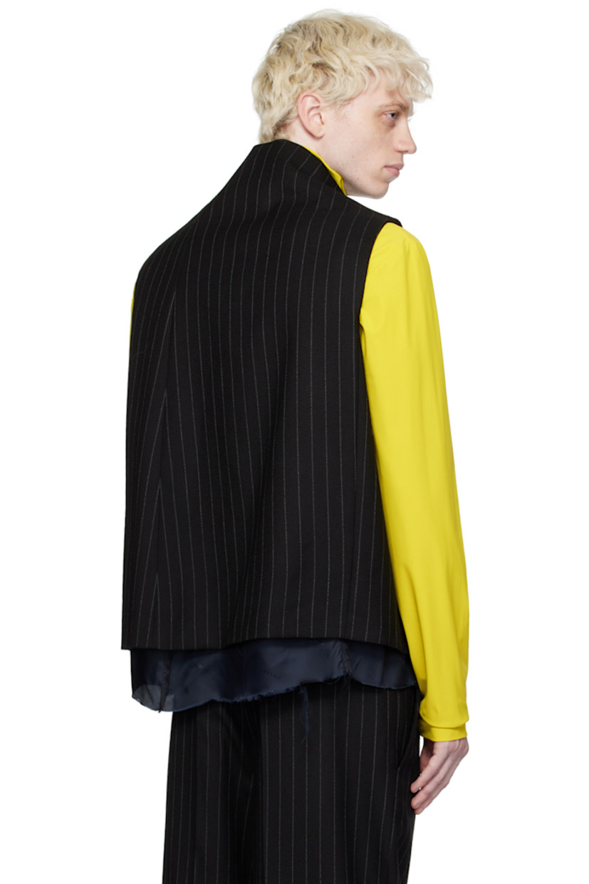 Wool twill tank top. Pinstripes throughout. 

· Four-button placket at foldover collar
· Raw edge at hem
· Seam pockets
· Full logo-woven satin lining

Supplier color: Pinstripe