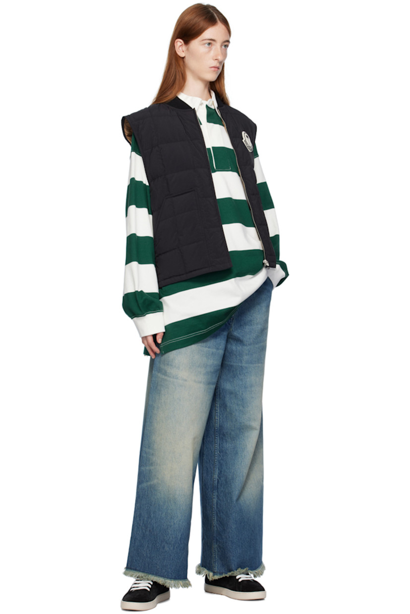 Down-filled quilted nylon taffeta vest. 

· Rib knit stand collar 
· Zip closure 
· Chenille logo patch at chest 
· Patch pockets 
· Shirttail hem 
· Full satin lining 

Part of the Moncler Genius x Palm Angels collaboration.

Supplier color: Black 

Fill: 90% goose down, 10% feathers.