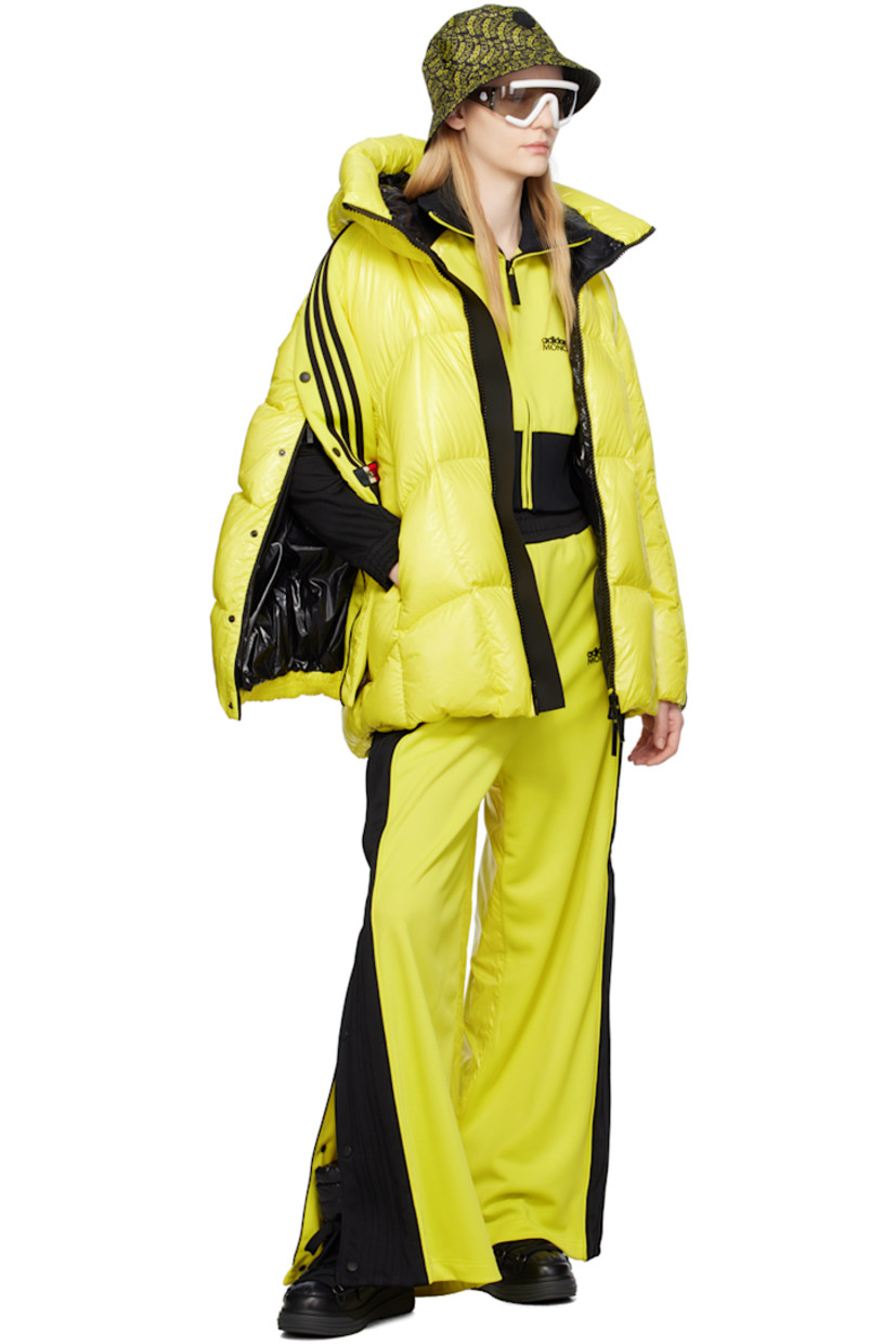 Paneled polyester jersey and nylon satin trousers. Stripe appliqués and zip vent with press-stud hardware at outseams.

· Concealed drawstring at elasticized waistband
· Two-pocket styling
· Rubberized logo patch bonded at front and back
· Rib knit elasticized cuffs
· Logo-engraved gunmetal-tone hardware

Part of the Moncler Genius x adidas Originals collaboration. 

Supplier color: Yellow