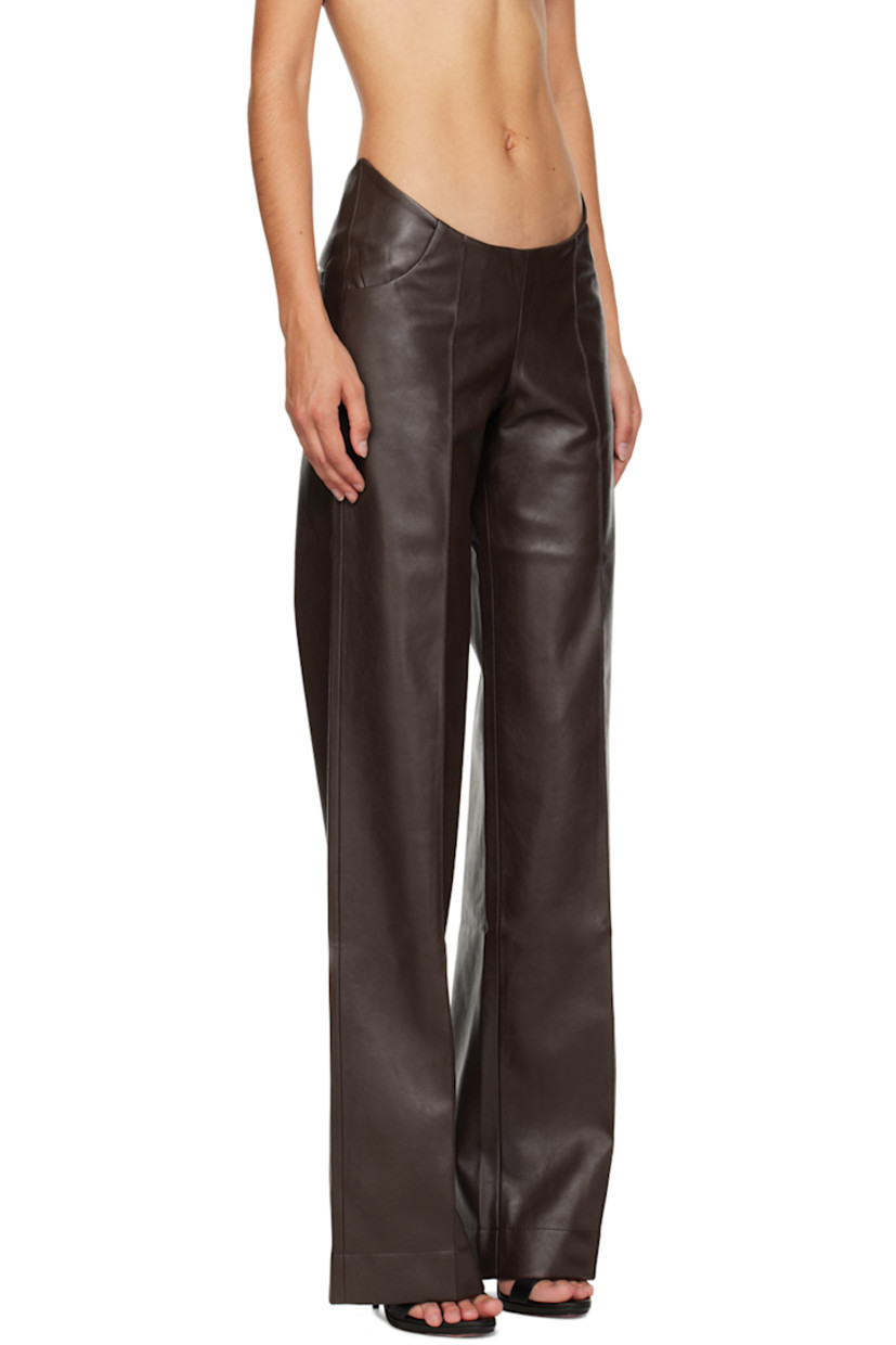 Buffed faux-leather trousers.

· Modified waistband
· Three-pocket styling
· Pinched seam at front legs
· Concealed zip closure at outseam
· Darts at back

Supplier color: Burgundy