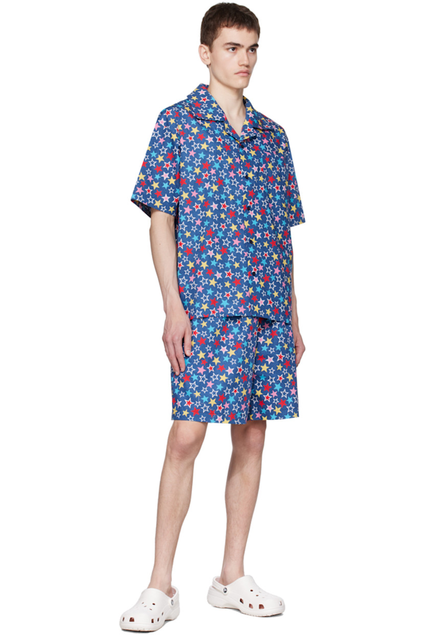 Cotton poplin shorts. Graphic pattern printed throughout. 

· Elasticized waistband
· Two-pocket styling

Supplier color: Blue