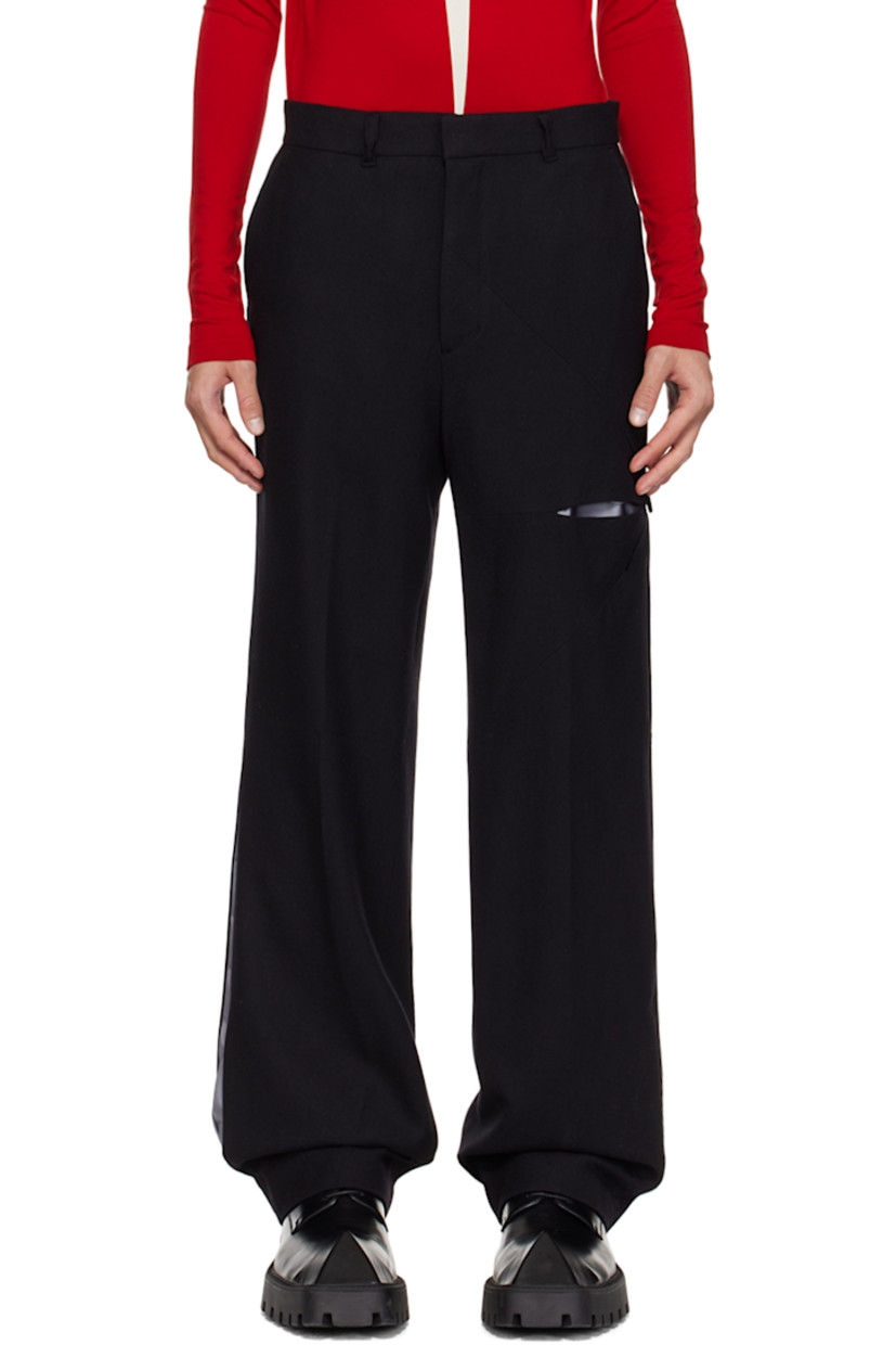 Brushed wool twill trousers. 

· Belt loops
· Four-pocket styling
· Zip-fly
· Cutouts at outseam 
· Full satiin lining

Supplier color: Black