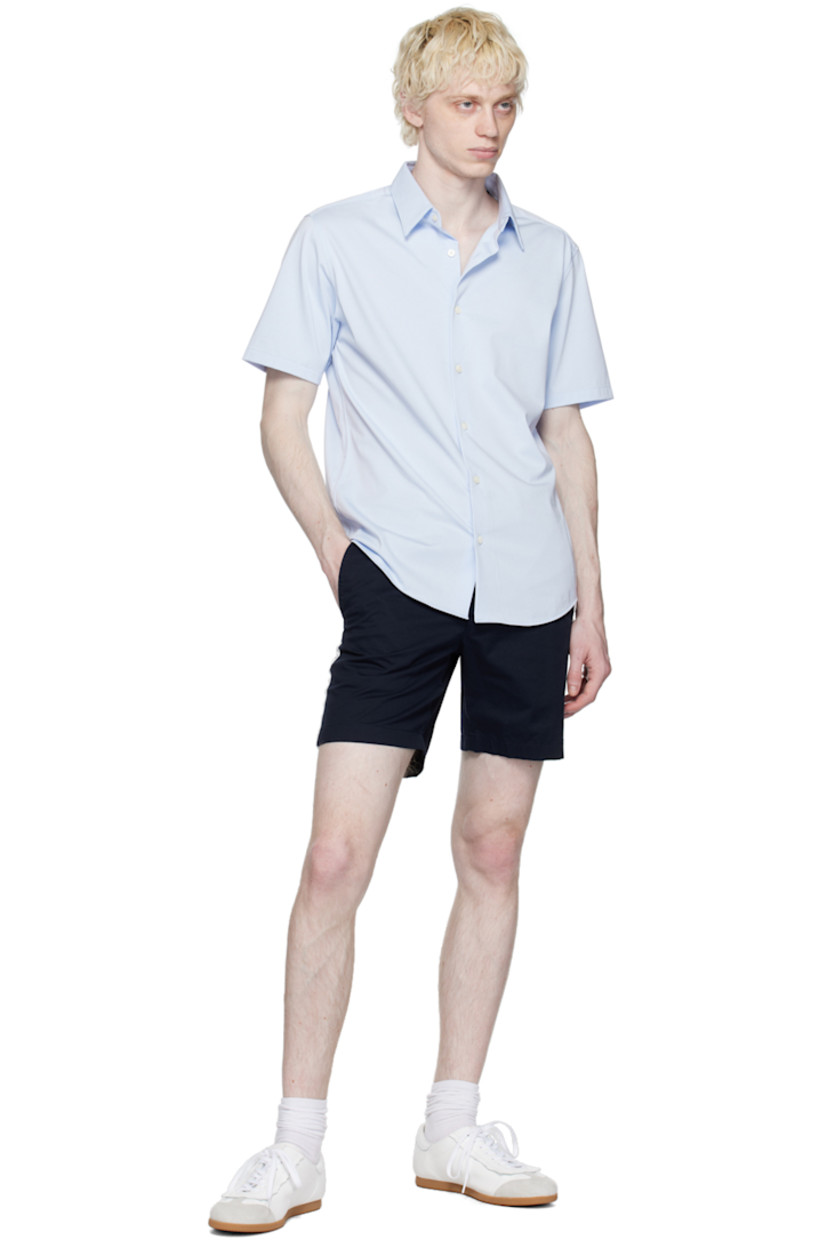 Stretch cotton twill shorts. 

· Belt loops
· Four-pocket styling
· Zip-fly
· Striped webbing trim at outseams

Supplier color: Baltic