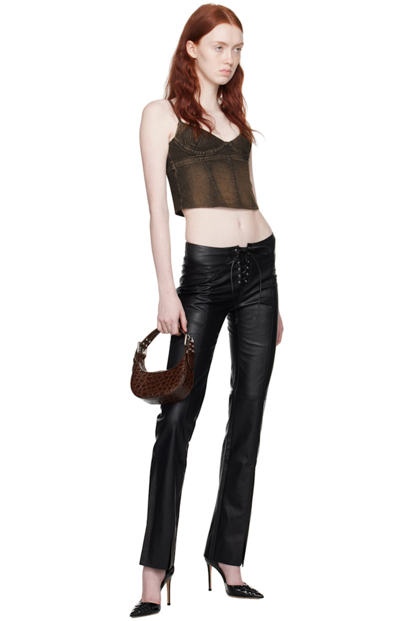 Deadstock non-stretch denim tank top. Boning and fading throughout. 

· Sweetheart neck 
· Underwire at padded cups 
· Adjustable spaghetti straps 
· Zip closure at back 

Supplier color: Ochre