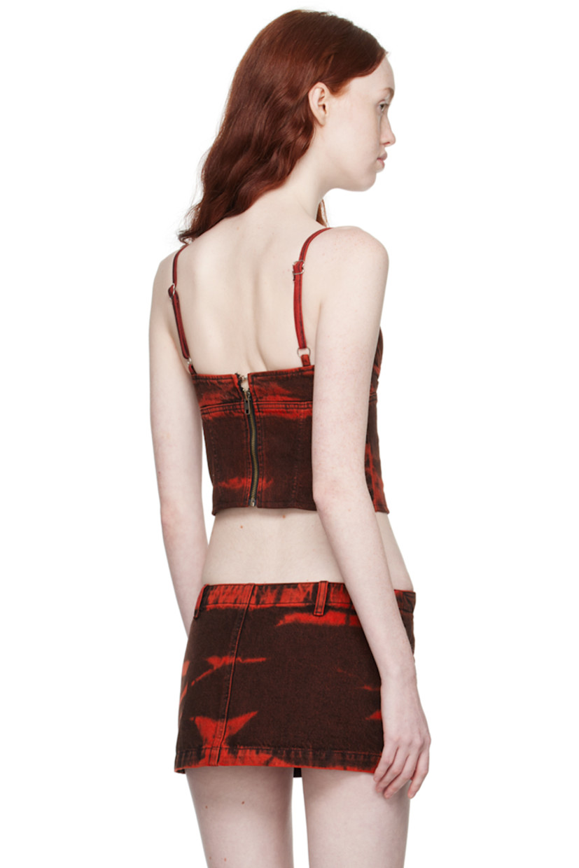 Deadstock non-stretch denim tank top. Boning and bleached effect throughout.

· Sweetheart neck 
· Underwire at padded cups 
· Adjustable spaghetti straps 
· Zip closure at back 

Supplier color: Red
