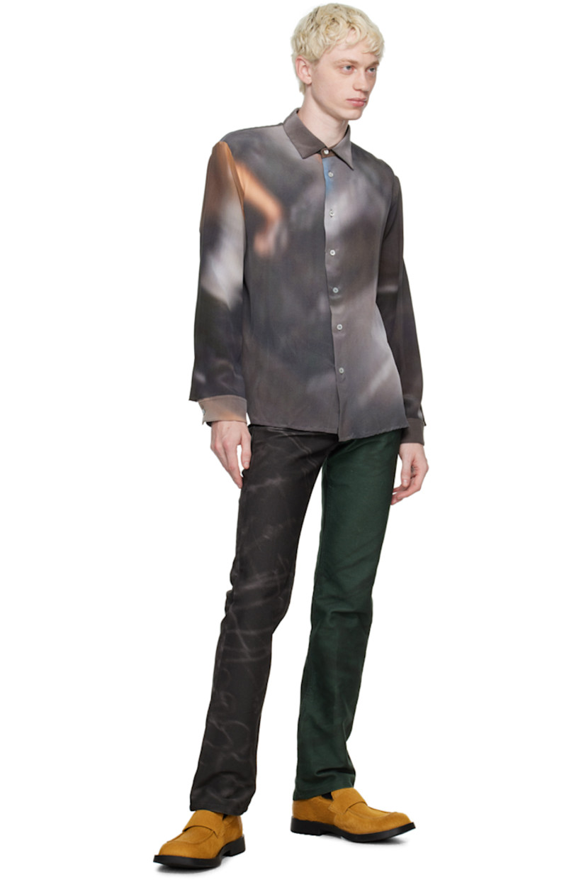 Paneled non-stretch denim jeans. Graphic pattern printed throughout.

· High-rise
· Belt loops
· Five-pocket styling
· Button-fly
· Leather logo patch at back waistband
· Logo flag at back pocket
· Logo-engraved antiqued silver-tone hardware

Supplier color: Print