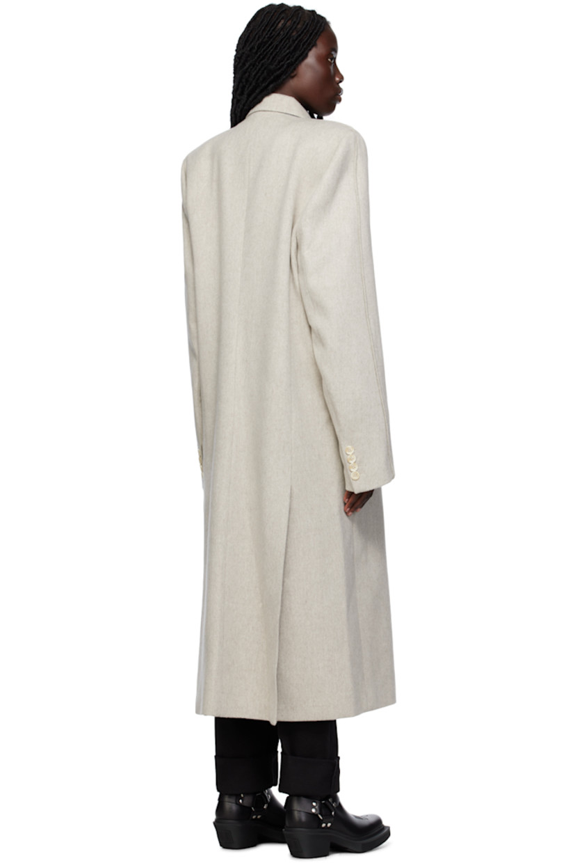 Felted virgin wool coat.

· Peaked lapel
· Double-breasted button closure
· Welt pocket and flap pockets
· Padded shoulders
· Four-button surgeon's cuffs
· Twin vents at back hem 
· Welt pockets at interior
· Logo-woven satin lining

Supplier color: White