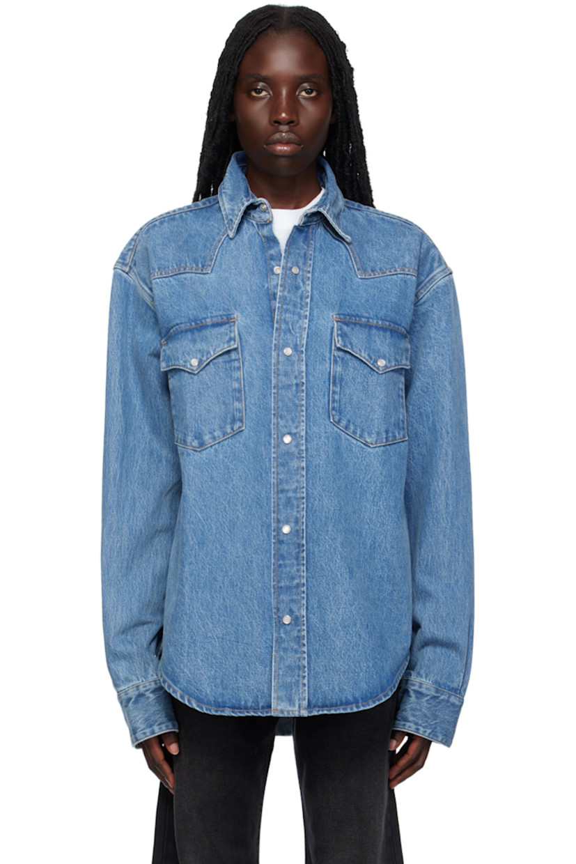 Non-stretch denim shirt. Fading throughout.

· Spread collar
· Press-stud closure
· Flap pockets
· Shirttail hem
· Press-stud fastening at vented cuffs
· Contrast stitching in tan

Supplier color: Blue