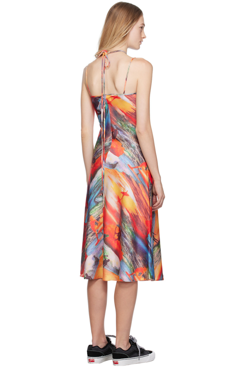 Polyester satin dress. Graphic printed throughout.

· Square neck 
· Fixed spaghetti shoulder straps
· Self-tie halter straps
· Central seam at back

Supplier color: Red sunset