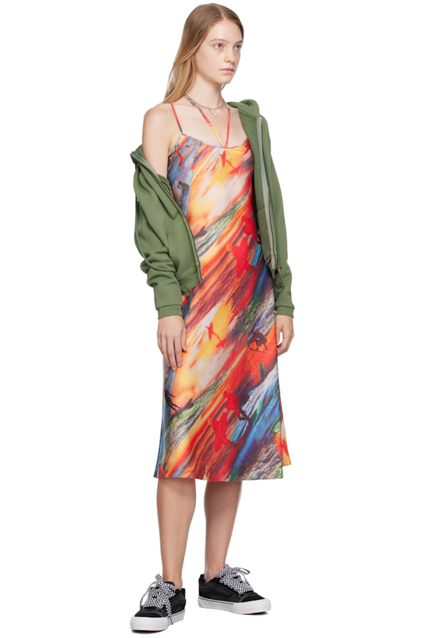 Polyester satin dress. Graphic printed throughout.

· Square neck 
· Fixed spaghetti shoulder straps
· Self-tie halter straps
· Central seam at back

Supplier color: Red sunset