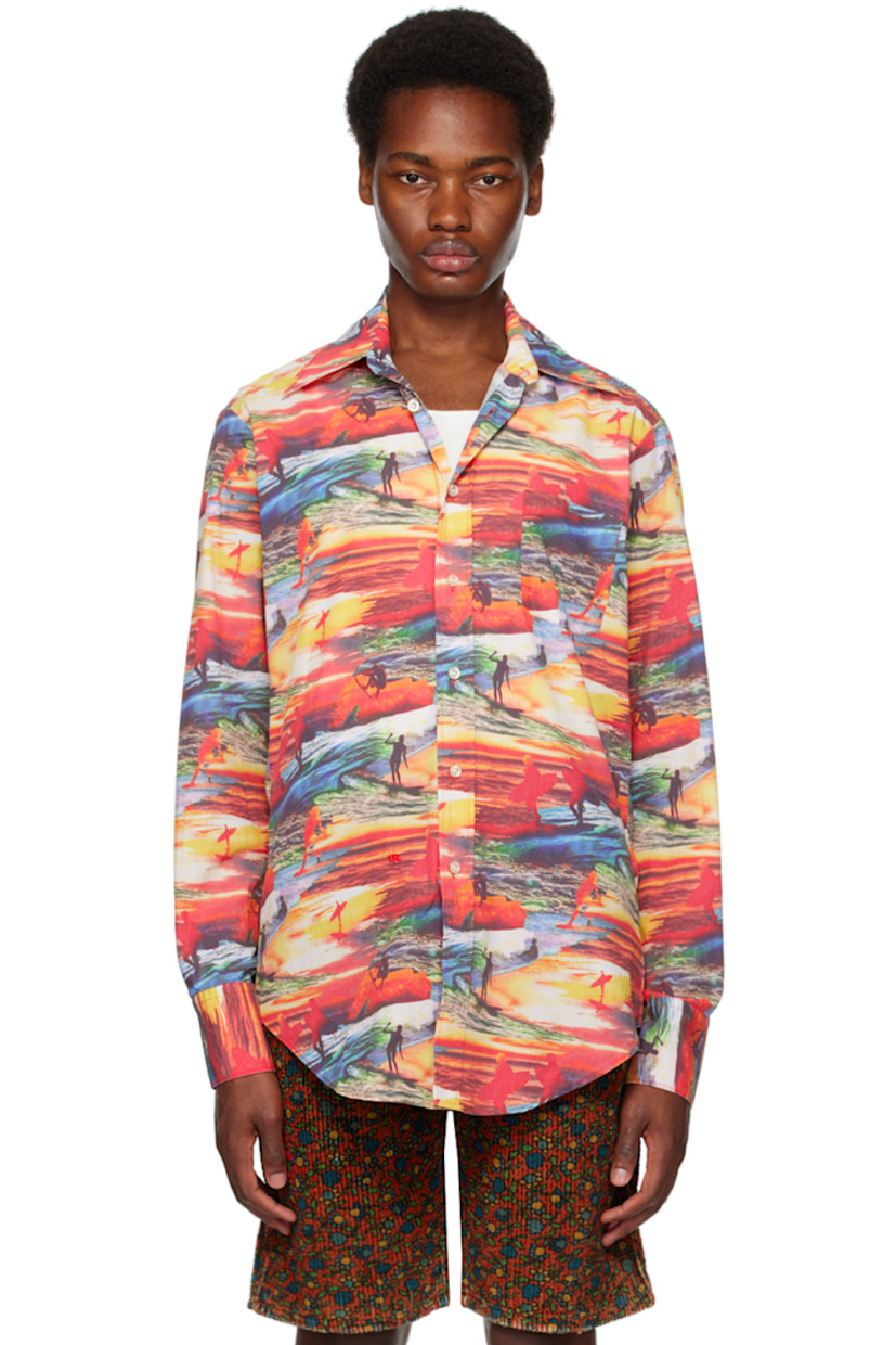 Cotton poplin shirt. Graphic pattern printed throughout. 

· Spread collar
· Button closure
· Patch pocket at chest
· Logo embroidered at front
· Shirttail hem
· Two-button barrel cuffs
· Box pleat at back yoke

Supplier color: Red Sunset
