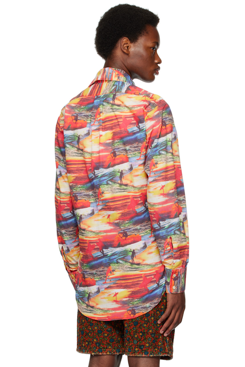 Cotton poplin shirt. Graphic pattern printed throughout. 

· Spread collar
· Button closure
· Patch pocket at chest
· Logo embroidered at front
· Shirttail hem
· Two-button barrel cuffs
· Box pleat at back yoke

Supplier color: Red Sunset