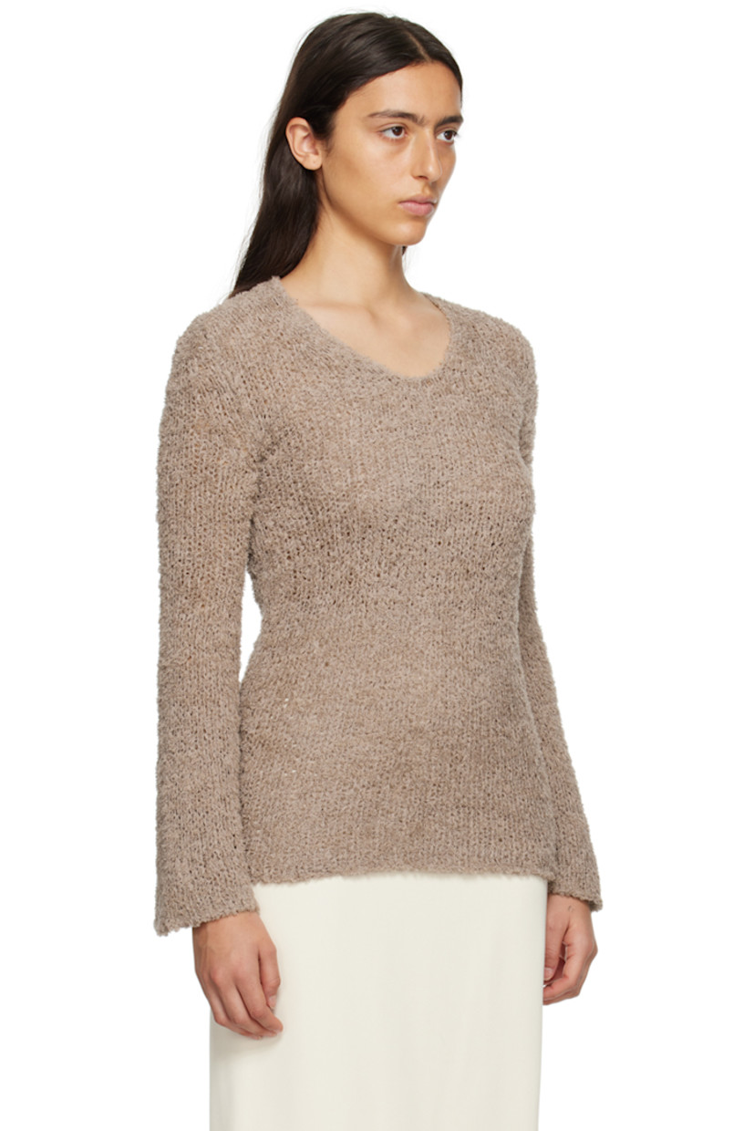 Shag knit organic cotton- and recycled nylon-blend sweater.

· Scoop neck
· Flared cuffs

Supplier color: Fallen rock