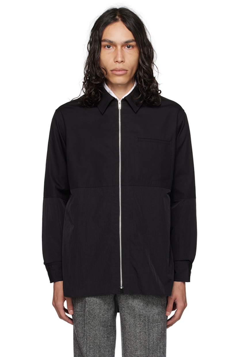 Paneled cotton canvas and crinkled nylon taffeta jacket.

· Spread collar
· Zip closure
· Flap pocket at chest
· Gussets at shirttail hem
· Seam pockets
· Single-button barrel cuffs

Supplier color: Black