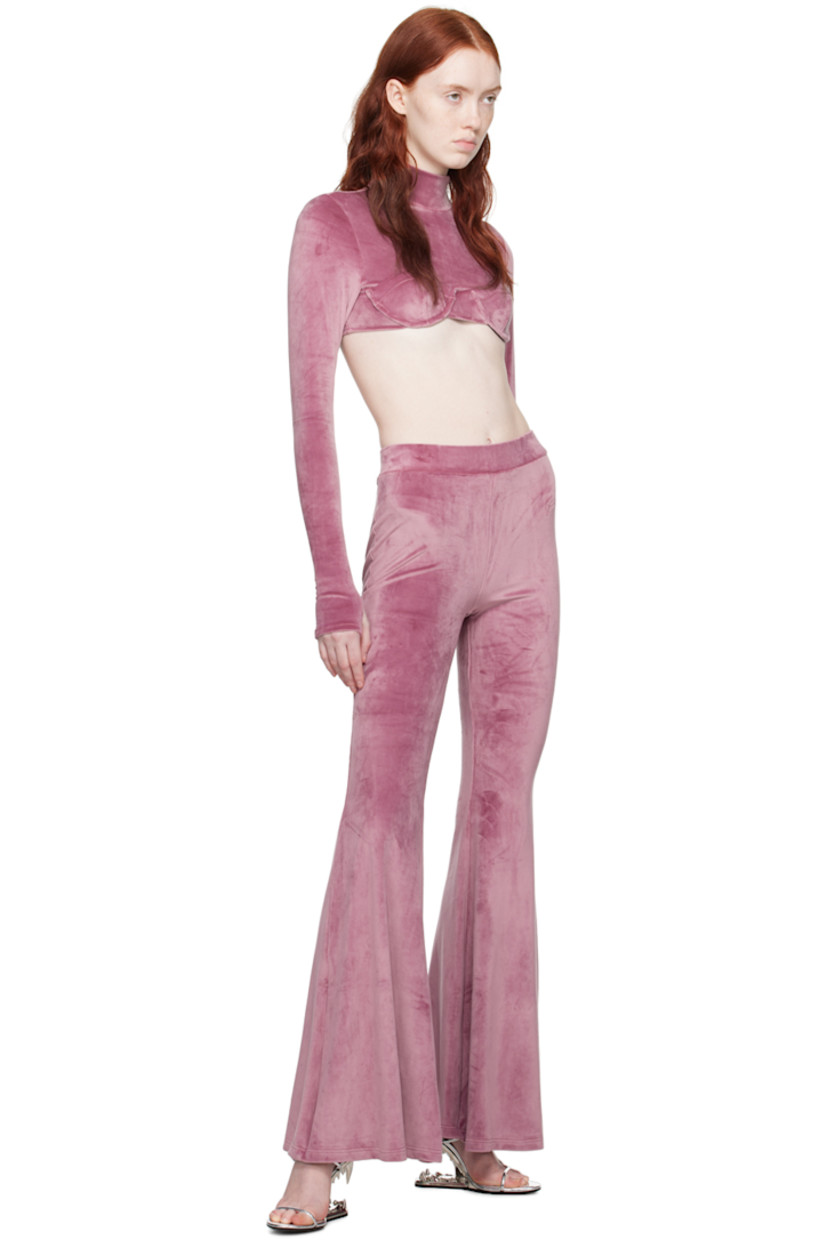 Stretch polyester velvet turtleneck.

· Mock neck
· Underwire at cups
· Cropped hem
· Concealed zip closure at shoulder
· Thumbhole at cuffs
· Logo-engraved hook-eye closure at open back

Supplier color: Mauve pink