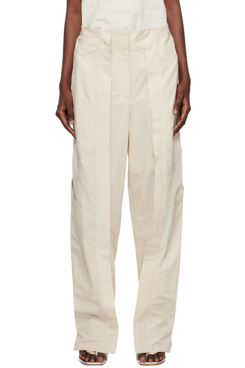 Relaxed-fit cotton twill trousers. Exposed seams throughout.

· Paneled construction
· Two-pocket styling 
· Zip-fly
· Modified pleats at front legs 
· Adjustable button-tab at cuffs
· Patch pocket at outseams

Supplier color: Putty
