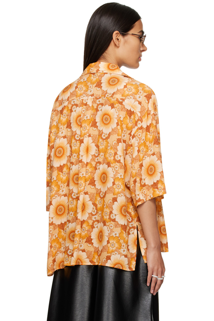 Plain-woven ECOVERO™ viscose shirt. Floral pattern printed throughout. 

· Spread collar
· Button closure
· Logo-engraved hardware

Supplier color: Wallpaper flowers