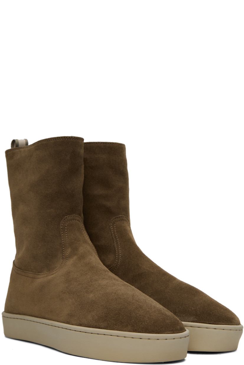 Handcrafted high-top suede sneakers in taupe.

· Zip closure at inner side
· Grosgrain pull-loop at heel collar
· Shearling lining
· Treaded Lactae Hevea® latex rubber sole

Supplier color: Tundra/Herbe