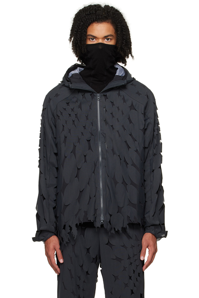 Stretch nylon taffeta jacket. Detachable stretch mesh overlay with frayed hem and laser-cut perforated detailing throughout 

· Layered construction
· Water-resistant and breathable 
· Bungee-style drawstring at hood
· Stand collar 
· Two-way zip closure 
· Zip pockets
· Concealed bungee-style drawstring at hem
· Elasticized cuffs
· Unlined

Part of the 5.1 collection.

Supplier color: Black