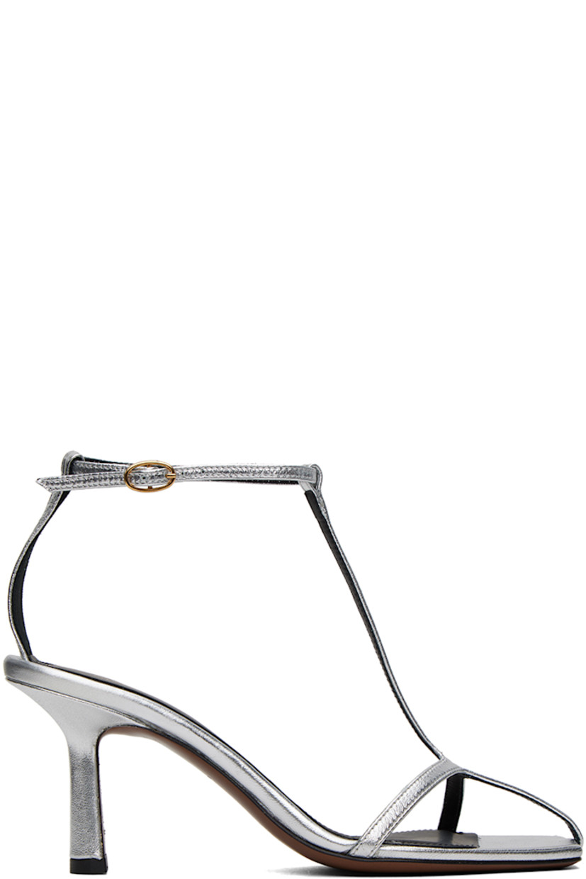 Grained leather heeled sandals in metallic silver-tone. 

· Open square toe
· Pin-buckle ankle strap
· Logo embossed at padded leather footbed
· Covered stiletto heel with rubber injection
· Leather sole
· Heel: H3.5 in

Supplier color: Silver