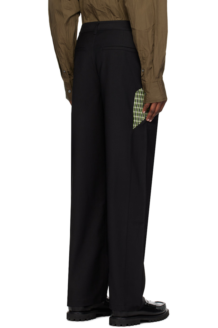 Paneled stretch viscose- and wool-blend twill trousers.

· Paneled construction
· Belt loops
· Four-pocket styling
· Zip-fly
· Plain-woven trim at front
· Logo graphic embroidered at front
· Full satin twill lining

Supplier color: Black