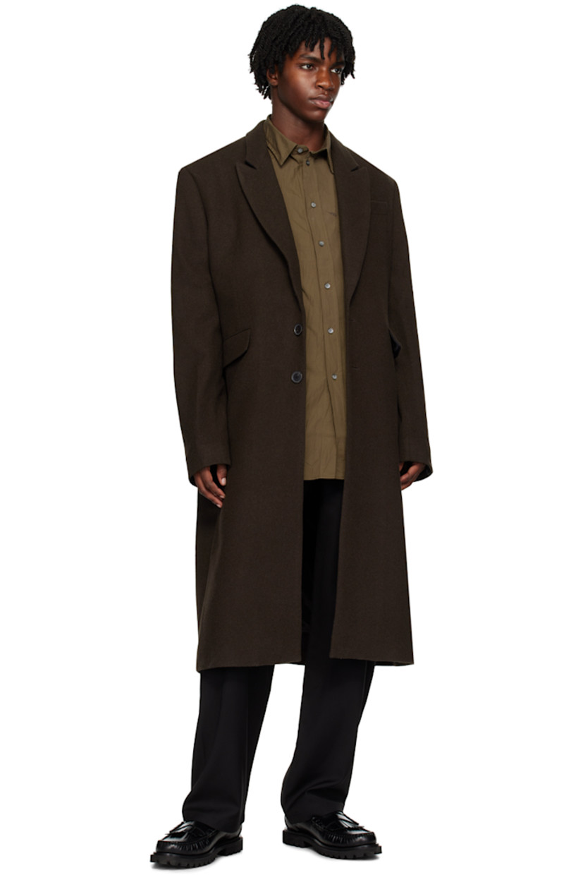 Paneled stretch viscose- and wool-blend twill trousers.

· Paneled construction
· Belt loops
· Four-pocket styling
· Zip-fly
· Plain-woven trim at front
· Logo graphic embroidered at front
· Full satin twill lining

Supplier color: Black