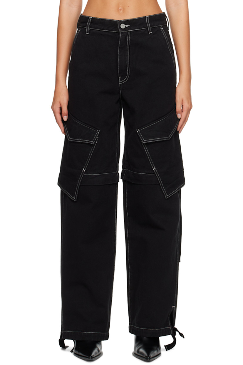 Relaxed-fit straight-leg garment-dyed non-stretch denim jeans. 

· Belt loops 
· Four-pocket styling 
· Zip-fly 
· Flap pockets at leg 
· Detachable zip panel at legs for alternate styling 
· Drawstring at cuffs 
· Leather logo patch at back waistband 
· Strap detailing at back 
· Contrast stitching in white 

Supplier color: Black