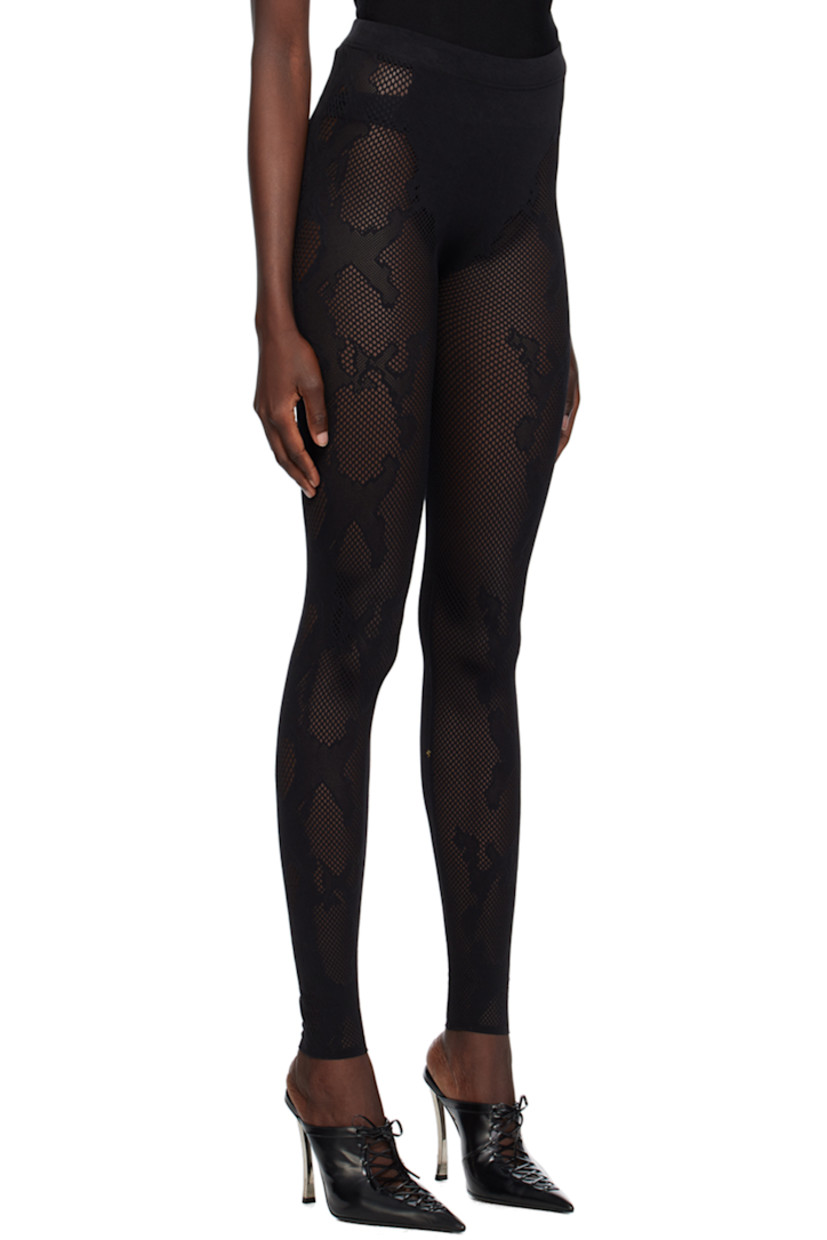 Stretch recycled nylon-blend mesh leggings. Jacquard snakeskin pattern throughout.

· Seamless construction
· High-rise
· Elasticized waistband
· Raw edge at hem
· Unlined

Supplier color: Black