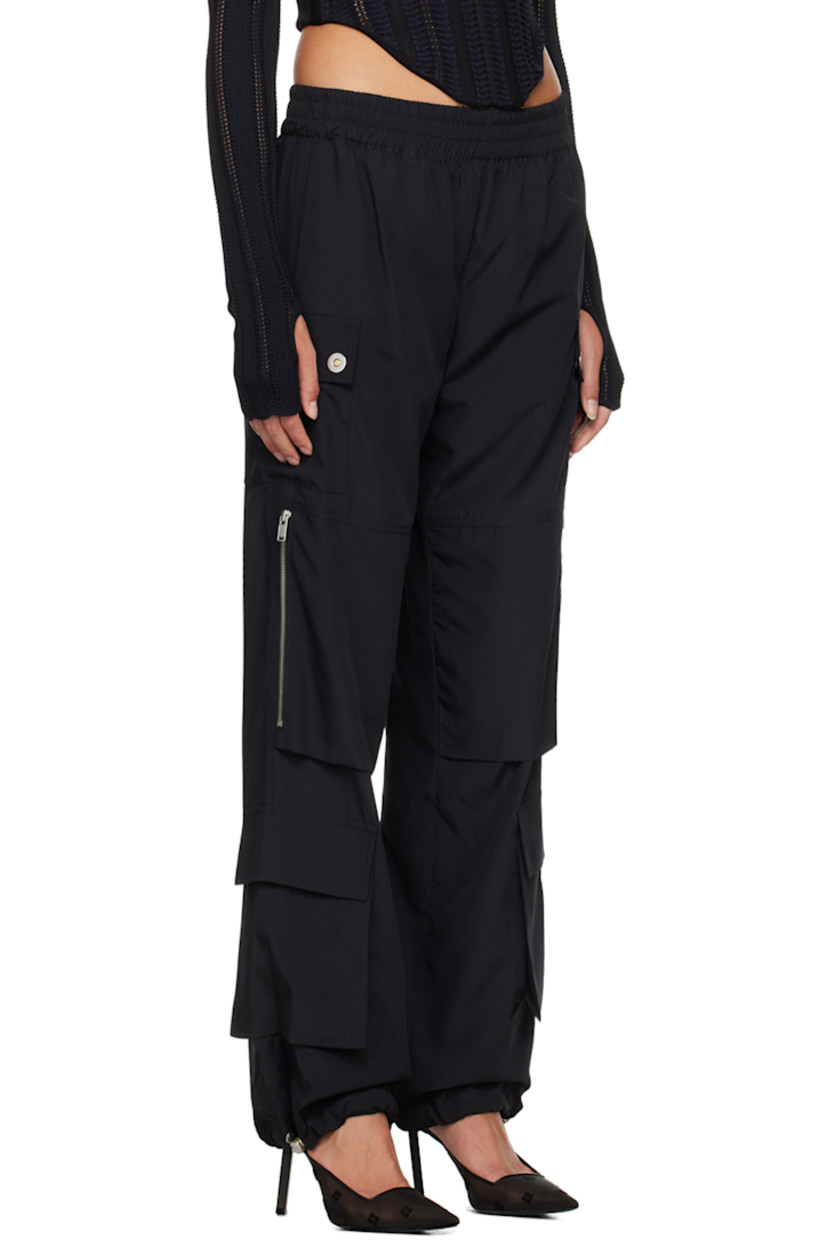 Plain-woven recycled polyester trousers.

· Paneled construction
· Elasticized waistband
· Four-pocket styling
· Patch and zip pockets at front
· Bungee-style drawstring at elasticized cuffs
· Logo-engraved silver-tone hardware

Supplier color: Black