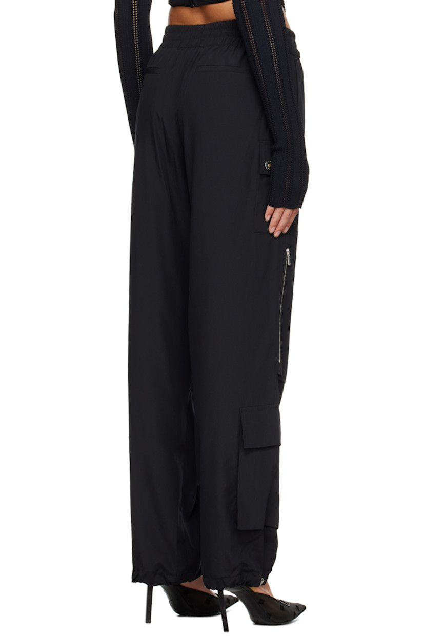 Plain-woven recycled polyester trousers.

· Paneled construction
· Elasticized waistband
· Four-pocket styling
· Patch and zip pockets at front
· Bungee-style drawstring at elasticized cuffs
· Logo-engraved silver-tone hardware

Supplier color: Black