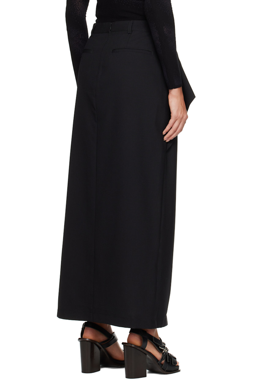 Wool graine de poudre skirt. 

· Belt loops 
· Zip detailing at waist 
· Four-pocket styling 
· Zip-fly 
· Slit at hem 
· Concealed zip closure at back 

Supplier color: Black
