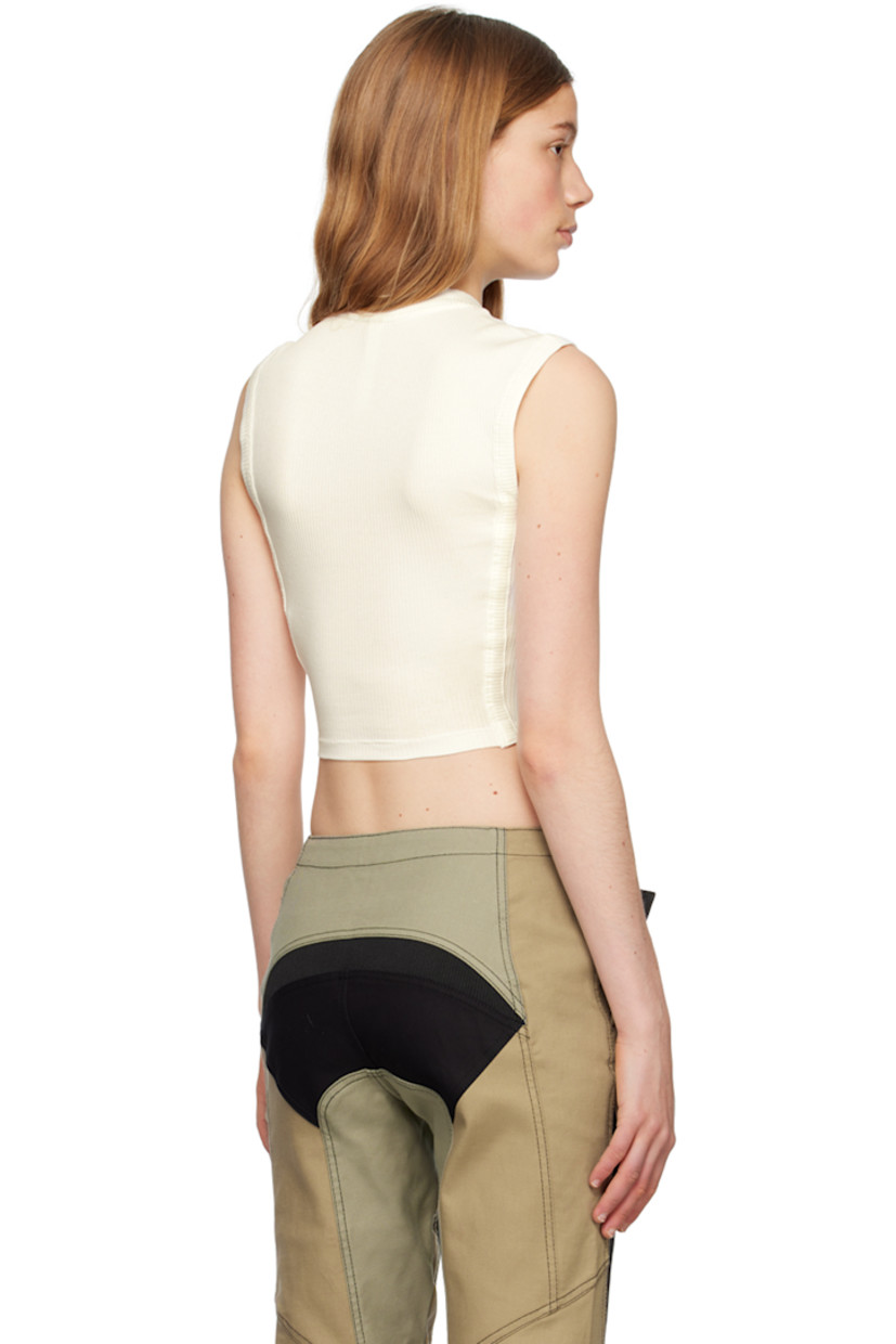 Rib knit stretch organic cotton tank top. 

· Crewneck
· Boning at front
· Asymmetric hem

Supplier color: Ivory