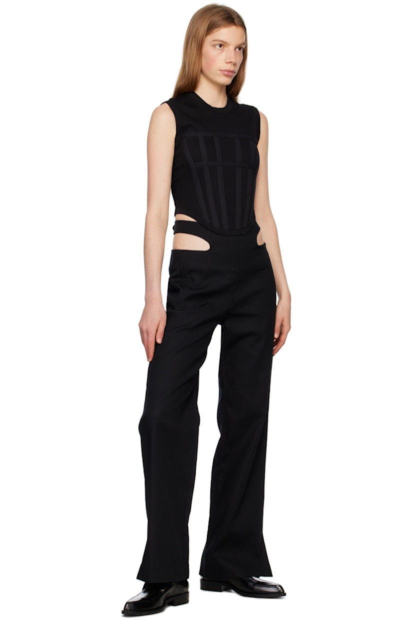 Rib knit stretch organic cotton tank top. 

· Crewneck
· Boning at front
· Asymmetric hem

Supplier color: Black