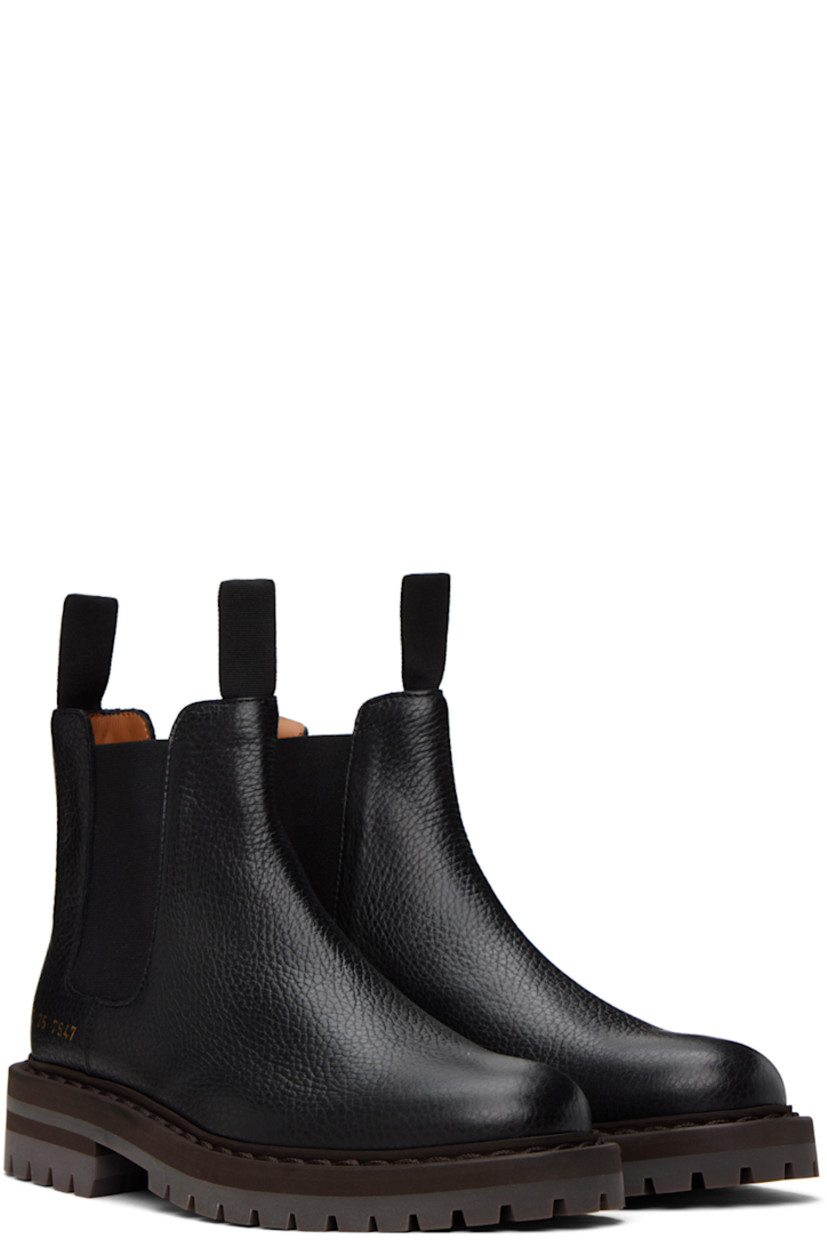 Ankle-high grained leather Chelsea boots in black. Signature series stamp in gold-tone at outer side.

· Grosgrain pull-loops at collar
· Elasticized gusset at sides
· Buffed leather lining in tan
· Stacked foam rubber midsole
· Treaded rubber sole
· Heel: H1.5 in

Supplier color: Black